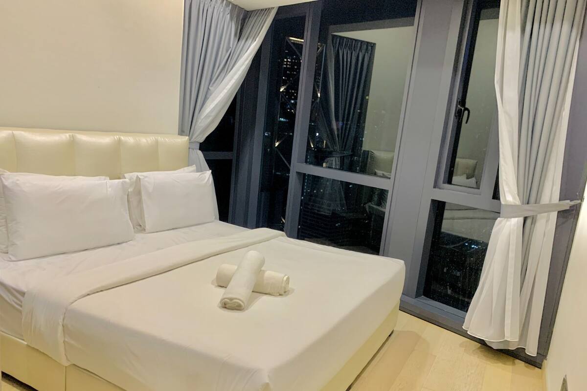 Family Apartment, 3 Bedrooms, City View | Memory foam beds, in-room safe, iron/ironing board, WiFi (free)