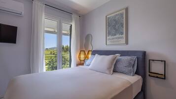 Deluxe appartement, 3 slaapkamers, uitzicht op bergen | Een strijkplank/strijkijzer, gratis wifi