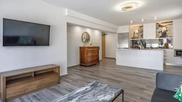 Deluxe appartement, 1 queensize bed | Woonruimte