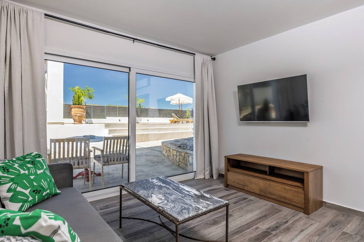 Appartement Deluxe, 1 grand lit | Coin séjour