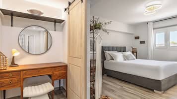 Apartemen Deluks, 1 Tempat Tidur Queen | Setrika/meja setrika dan Wi-Fi gratis