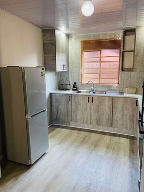 Private kitchen - Cozy Living Duplex 2 - 2BRM City Style Apartment in Maseru Lesotho (Maseru)