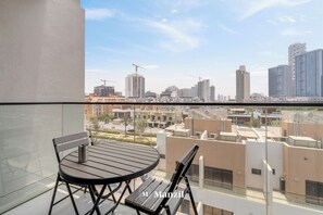 Luxury Apartment, Balcony, City View | Balcony - Manzil - 1BR Apartment in JVC with Pool  (Dubai)