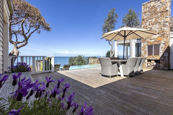Entertaining deck overlooking pool and stunning views