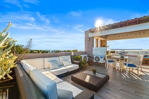 Outdoor dining - Tropical Sunset Penthouse • Rooftop & Hot Tub (Cabo Rojo)