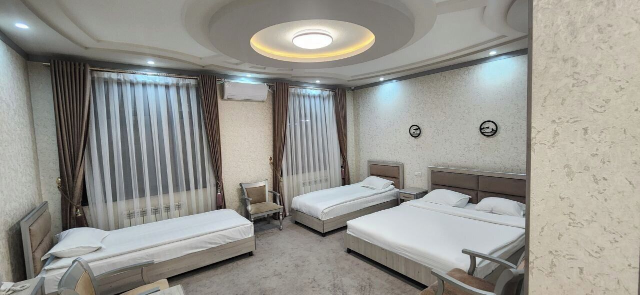 Quadruple Room, Garden View | Minibar, desk, free WiFi, bed sheets