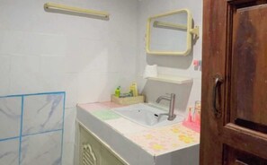 Shower, towels, soap, toilet paper