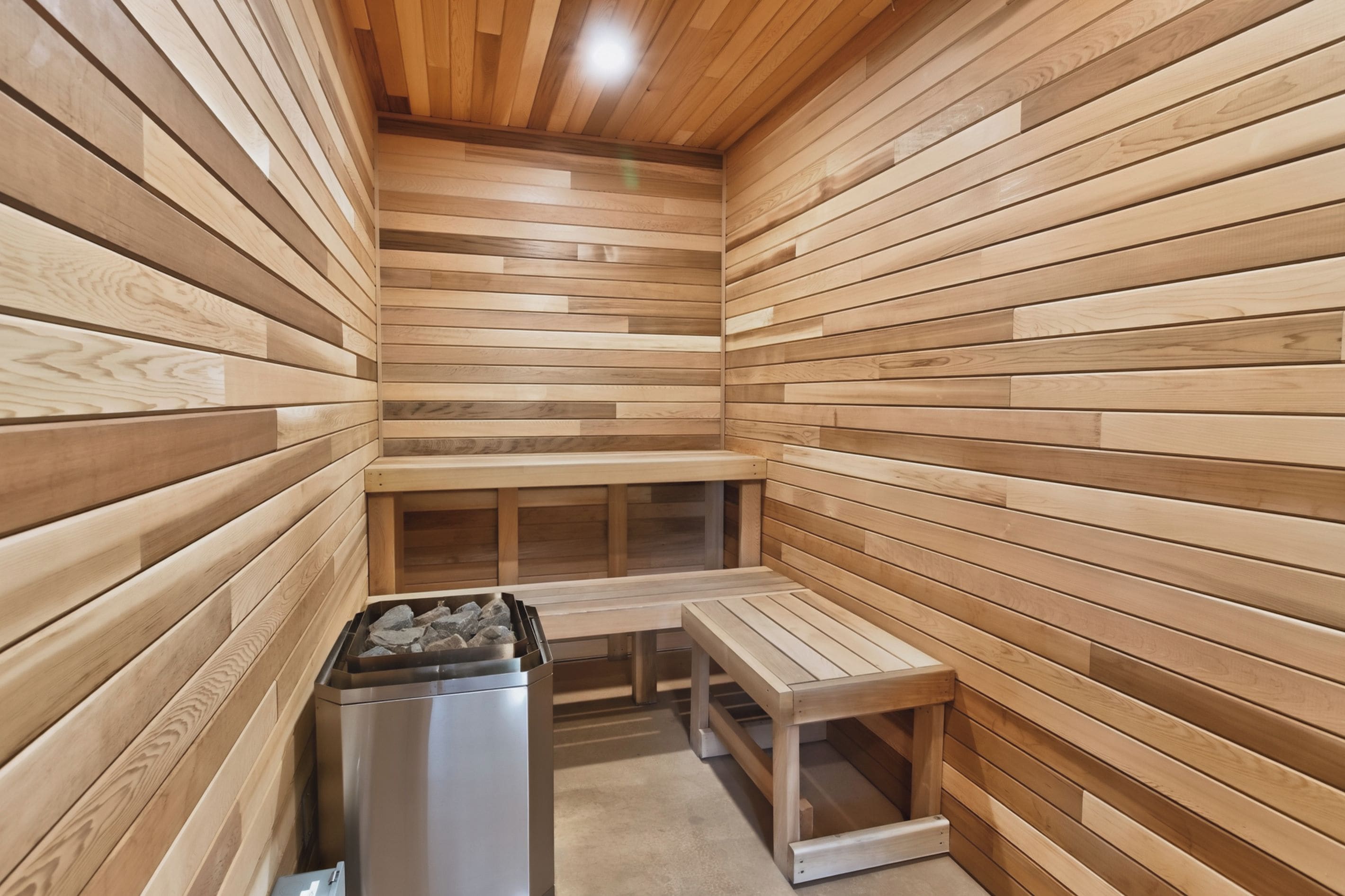 A sauna with wooden walls and benches.