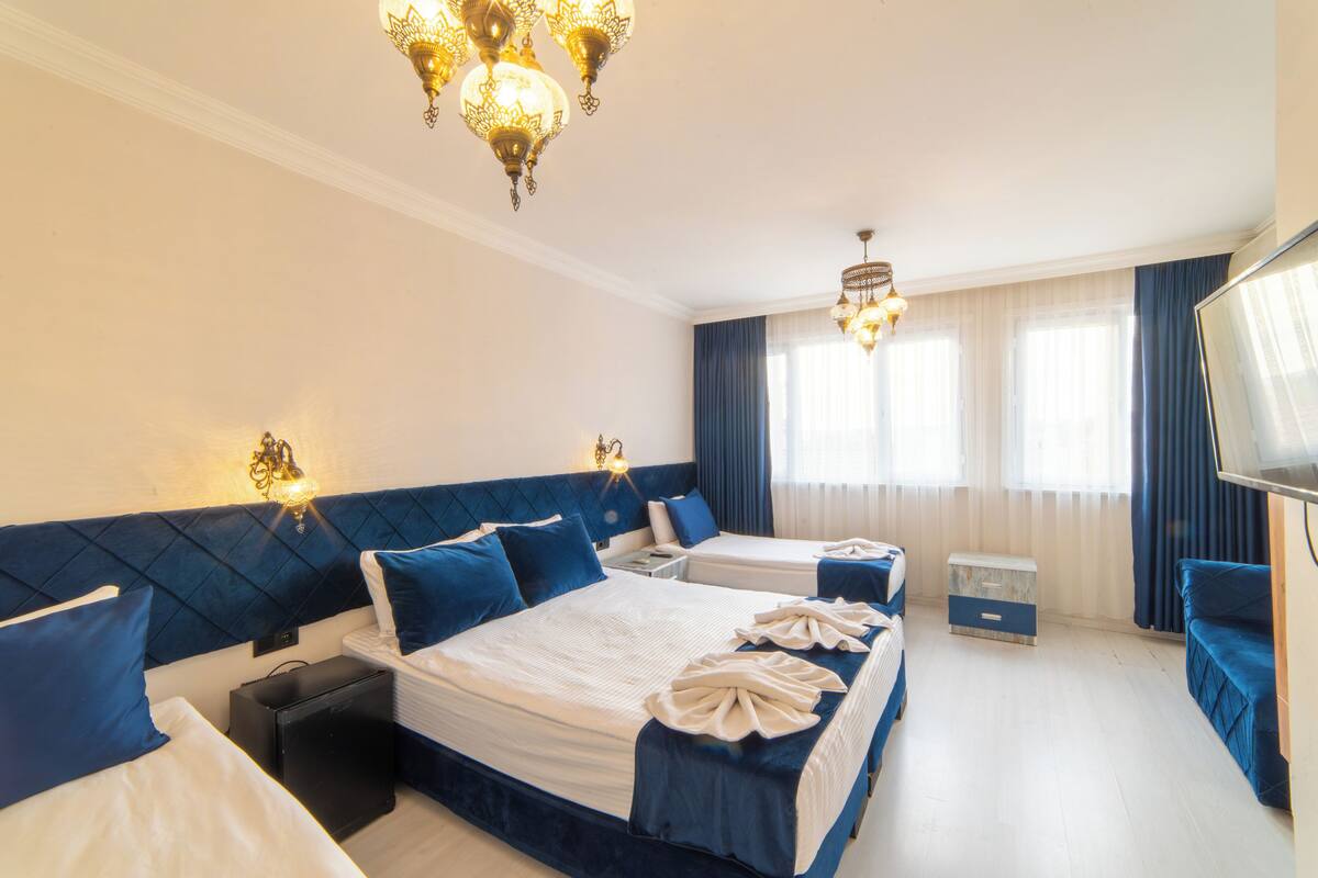 Family Quadruple Room | Desk, free WiFi