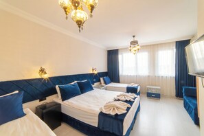 Family Quadruple Room | Desk, free WiFi