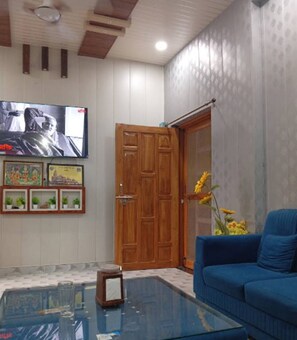 TV màn hình phẳng 32-inch có truyền hình cáp 