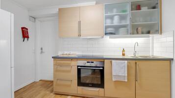 Fridge, stovetop, coffee/tea maker, cookware/dishes/utensils