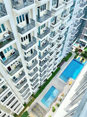 Condo, 1 Bedroom, Accessible, Smoking | Pool | Outdoor pool - Cozy Iloilo City Condo With Shared Pool and Fitness Center (Iloilo)