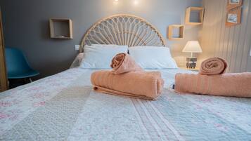 1 slaapkamer, een strijkplank/strijkijzer, wifi