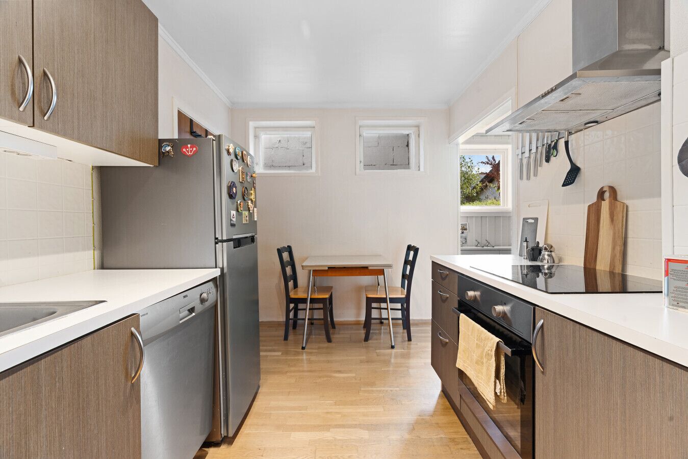 Fridge, stovetop, dishwasher, coffee/tea maker