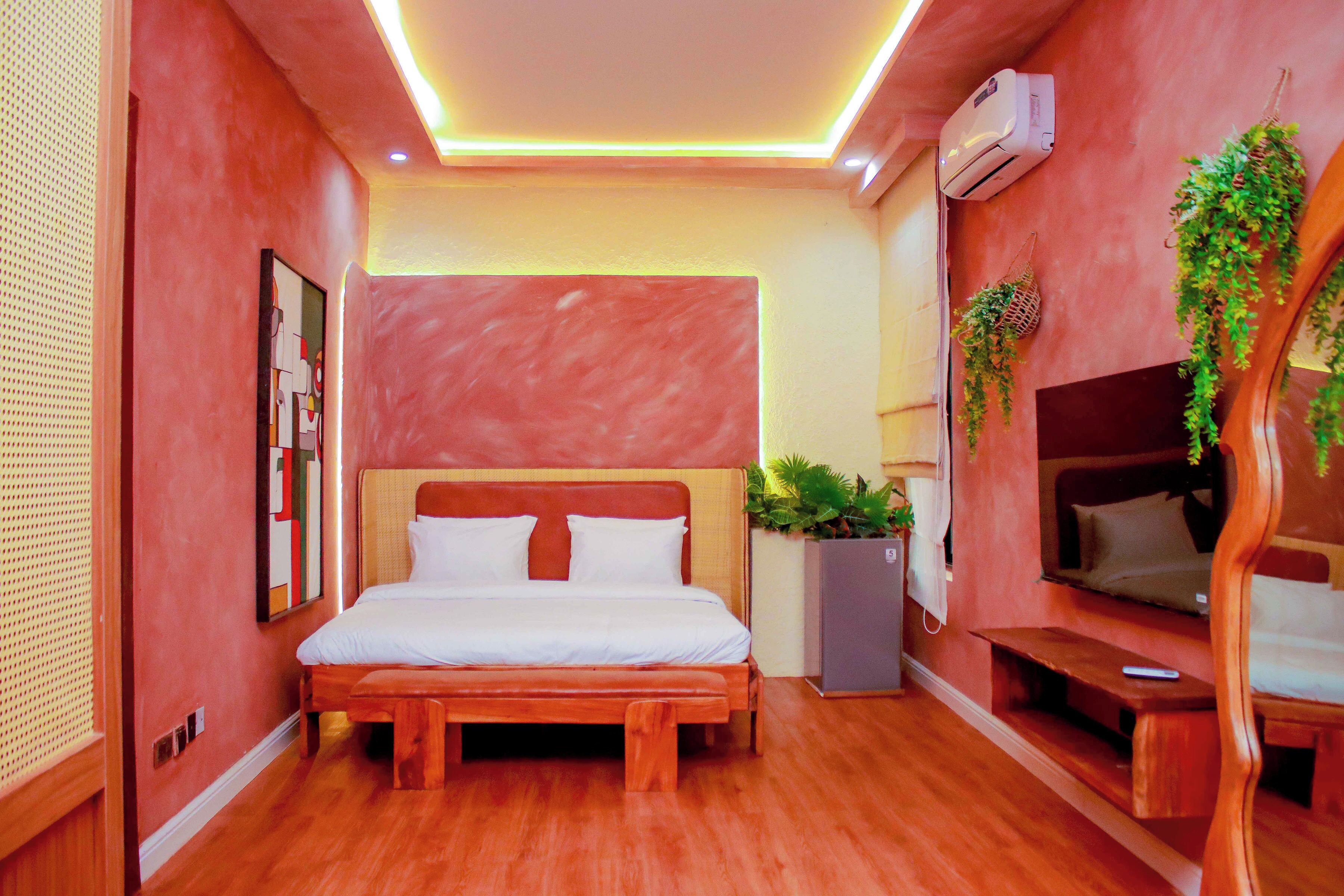 Luxury Suite, Balcony, Pool View | Desk, laptop workspace, free WiFi