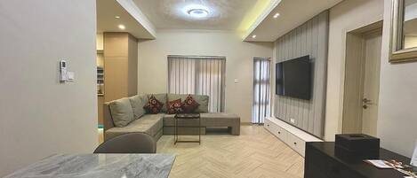 Executive tweepersoonskamer, uitzicht op tuin | Woonruimte