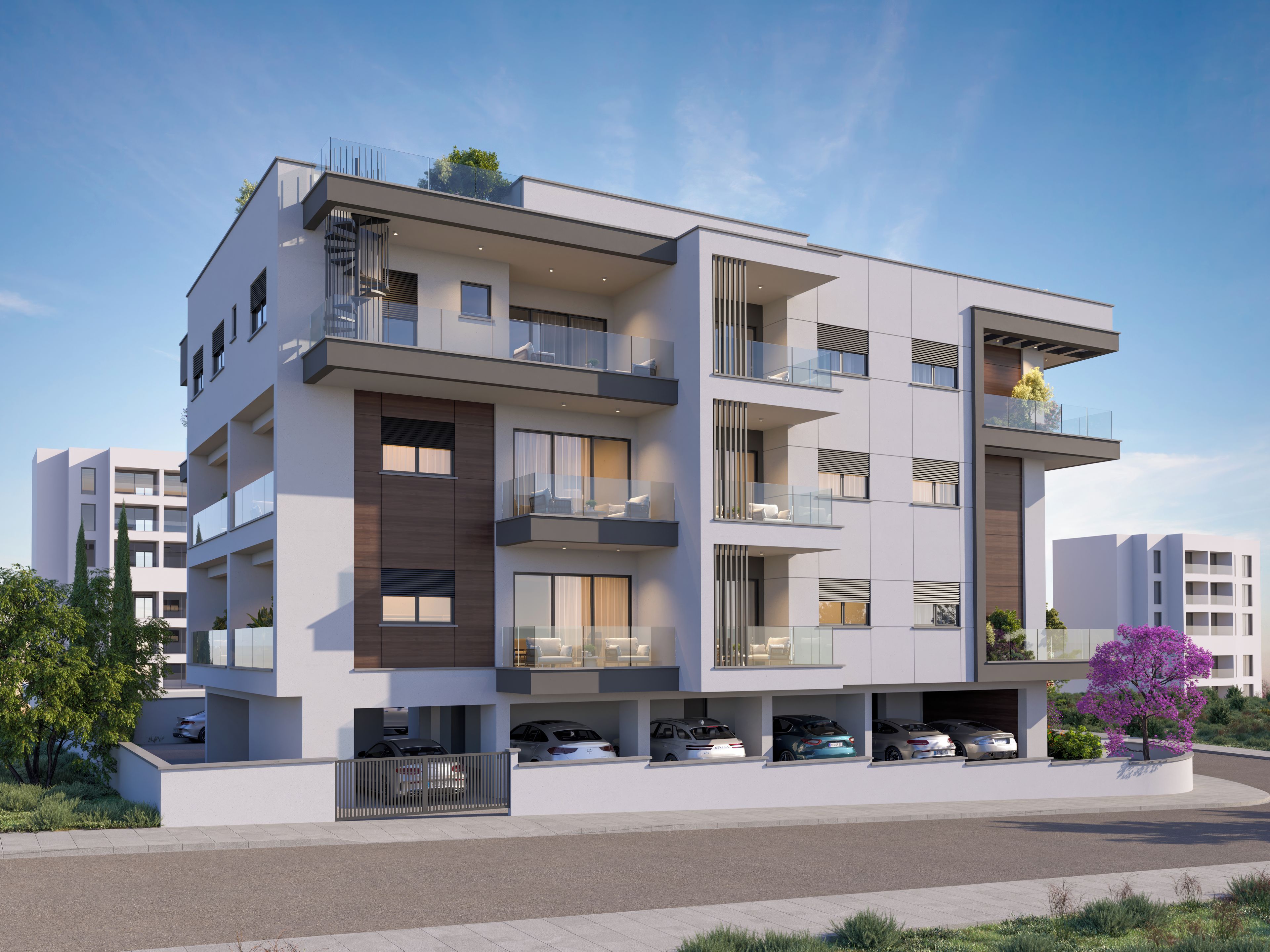 Un edificio residencial moderno de varios pisos con balcones, un estacionamiento techado y un jardín ajardinado con una planta floreciente morada.
