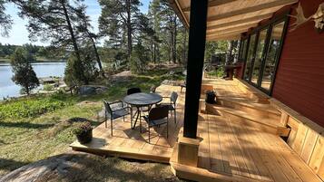 Stuga Classic - havsutsikt | Restaurang utomhus