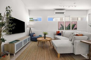 TV, offices - Botanical Suite | Artsy Retreat in Santurce! (San Juan)