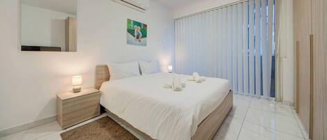 1 bedroom, desk, iron/ironing board, travel cot