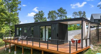 Sleek modern design meets mountain serenity in this 2BR luxury container. Enjoy a private deck and access to pool, hot tub, sauna, and gym for the perfect spring escape.