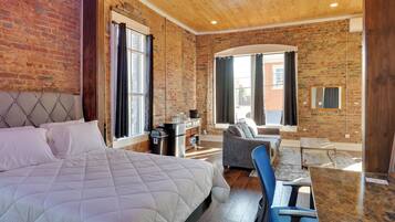 Apartment (0 Bedroom) | Laptop workspace, iron/ironing board, bed sheets