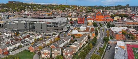 A residential area with a stadium and a church.