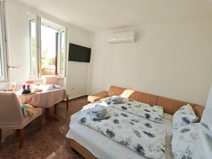 Classic Apartment, Patio, Garden View | Living area | 70-inch Smart TV with satellite channels - Belle Époque Boutique Apartment (Opatija)