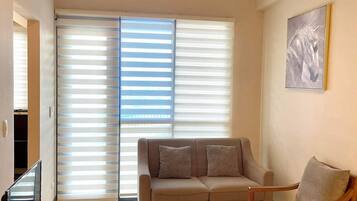 Condo Confort, 1 cama matrimonial, balcón, vista a la playa | Área de sala de estar