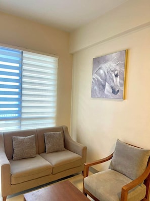 Comfort Condo, 1 Double Bed, Balcony, Beach View | Living area - Studio Seaview at Mactan Newtown  (Lapu-Lapu)