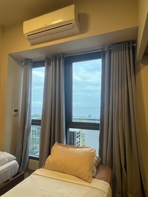 Condo conforto, sacada, vista para a praia | Espaço de trabalho para notebook, Wi-Fi de cortesia