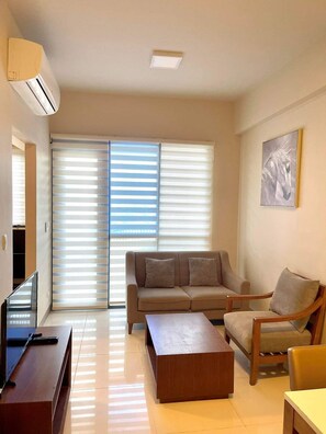 Comfort Condo, Balcony, Beach View | Living area - Studio Seaview unit at Mactan Newtown (Lapu-Lapu)