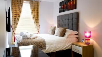 4 dormitorios, tabla de planchar con plancha, wifi y ropa de cama