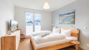 2 slaapkamers, een strijkplank/strijkijzer, gratis wifi