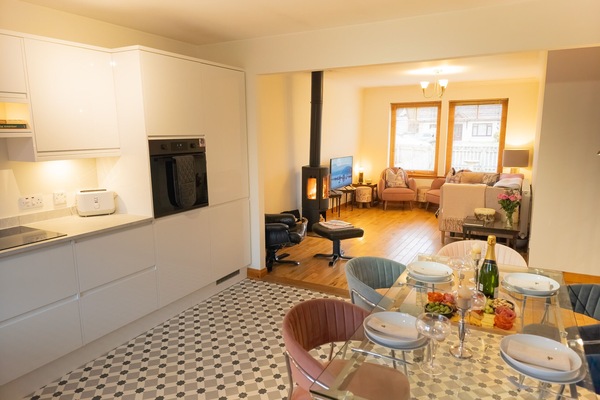 Open-plan living and dining area Aviemore holiday home