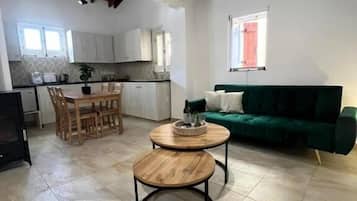 Superior Double Room | Living area | 43-inch Smart TV with satellite channels