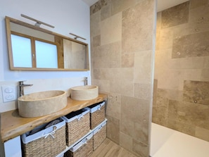 Shower, hair dryer, towels, toilet paper
