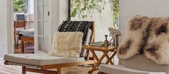 Modernised 70s cottage in forest near beach