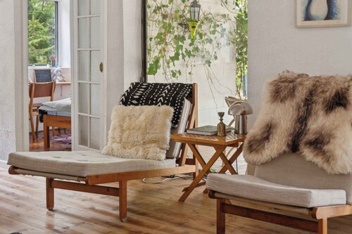 Modernised 70s cottage in forest near beach