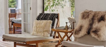 Modernised 70s cottage in forest near beach