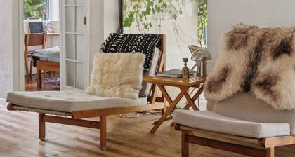 Modernised 70s cottage in forest near beach