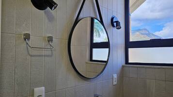 Shower, free toiletries, towels, soap