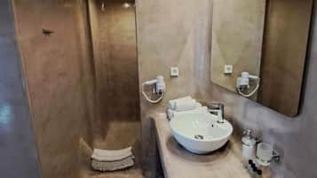 Shower, towels, soap, shampoo