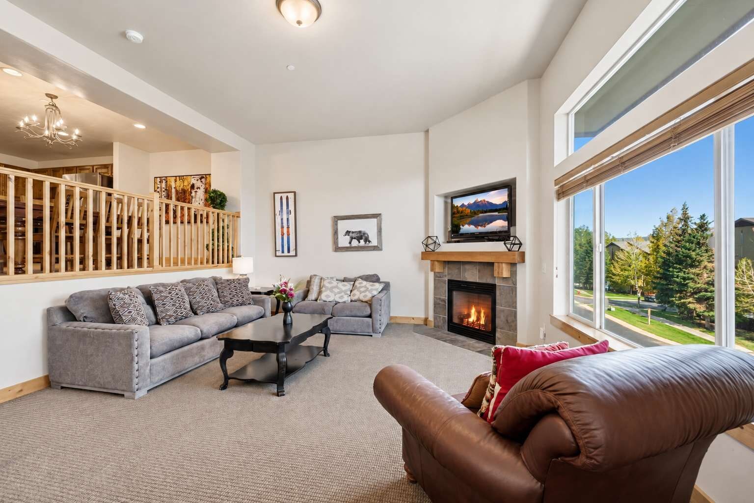 Spacious Living room with easy access to garage and front entry.