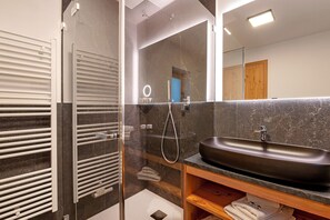 Shower, free toiletries, hair dryer, bathrobes
