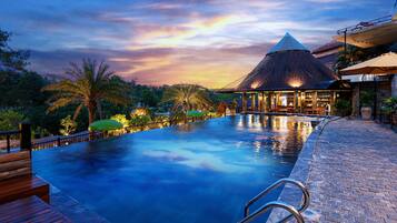 Outdoor pool, open 8:00 AM to 9:00 PM, pool umbrellas, pool loungers