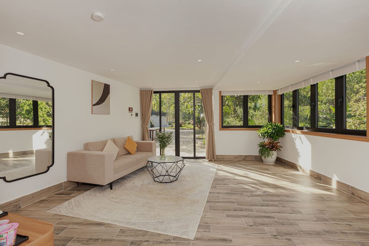 Deluxe Twin Room, Patio, Garden View | In-room safe, desk, laptop workspace, blackout curtains