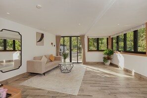 Deluxe Twin Room, Patio, Garden View | In-room safe, desk, laptop workspace, blackout curtains