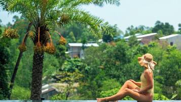 Outdoor pool, open 8:00 AM to 9:00 PM, pool umbrellas, sun loungers